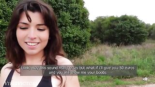 A young pretty girl was running and a guy picked her up in the middle of the road