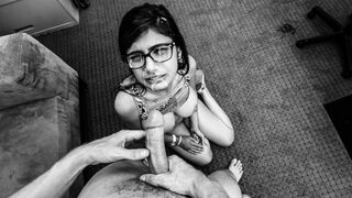 The porn actress Mia Khalifa performs in a black and white scene