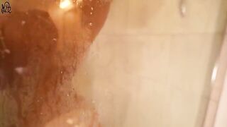 A young girl has sex with a huge dildo in the shower