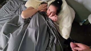 A man pisses on two girls sleeping in bed, wetting their panties