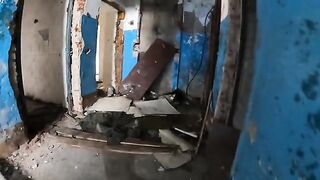An exhibitionist girl walks through abandoned buildings, getting intimate in public
