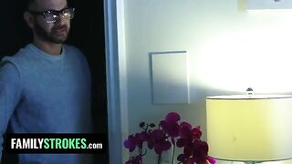 The stepdaughter pleasures her stepdad while her stepmom is in the room