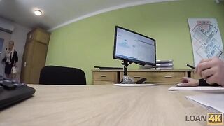 A business lady is trying to get a loan from the bank, but in a unique way