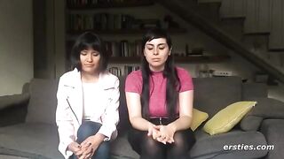 Two hot lesbians are having fun with a strapon, exploring new sensations