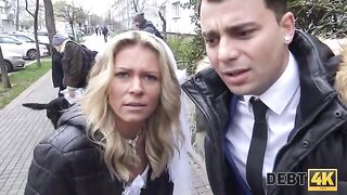 A blonde is having sex with a collector right in front of her future husband