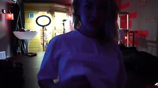 Kelly, a young and sensual woman, plays with her body in front of the camera
