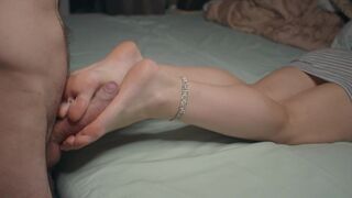 Petite babe shows off small feet, gets footjob, and cum on soles