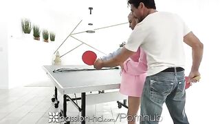 The guy pushed the winner of ping-pong in the cuminmouth