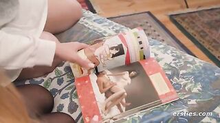 Two hot lesbians have fun while looking at the Kama Sutra