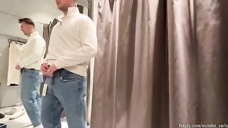 A couple gets naughty in the fitting room and almost gets caught