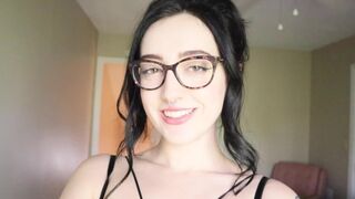 The girl is reading a hilarious book and trying not to cum
