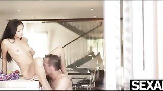Petite brunette gets fucked doggy style right on the kitchen counter
