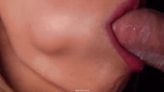 Horny babe sucks cock with a condom and breaks it, getting cum in her mouth