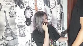 A very naughty girl talking on the phone with her boyfriend while being intimate with someone else
