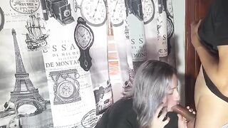 A very naughty girl talking on the phone with her boyfriend while being intimate with someone else