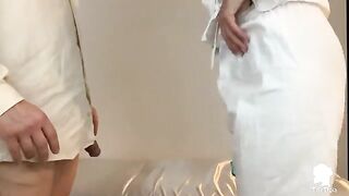 A patient with erection problems is visited by a doctor and nurse