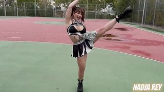 A cheerful cheerleader gets fucked on the public street and swallows the cum