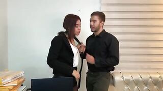 A hot secretary has sex with her boss in the office, ending with a cumshot