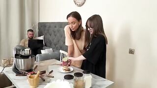 Two hot lesbians fuck with an unnamed man after cooking