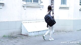 A girl is having fun with a stranger in the hostel
