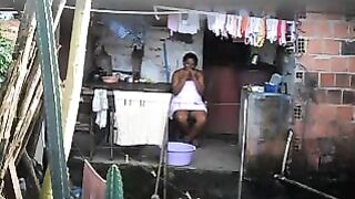 A black girl has no idea there's a hidden camera in the room