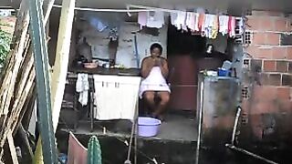 A black girl has no idea there's a hidden camera in the room