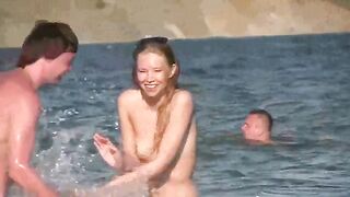 Nude beauty has sex on the beach