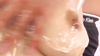 Oily handjob with a Japanese beauty, exploiting her juicy boobs to slide your dick in