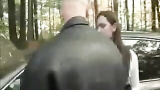 A man picked up a girl and tore her on the car's bonnet