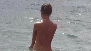 Nudist beauties are fucking on the beach without any clothes
