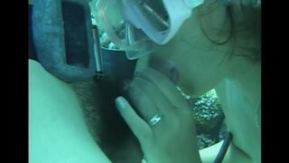 A man has sex with a girl with a hairy pussy underwater