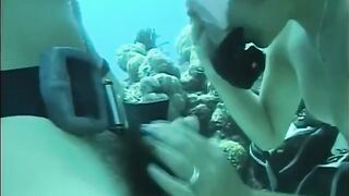 A man has sex with a girl with a hairy pussy underwater