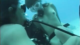 A man has sex with a girl with a hairy pussy underwater