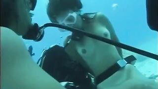 A man has sex with a girl with a hairy pussy underwater