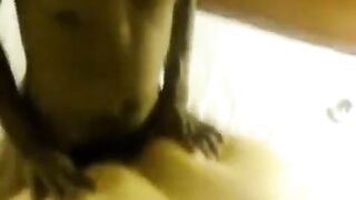 A fat woman lay down on a man with her big body