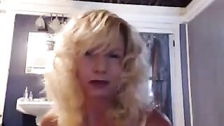A mature woman plays with herself in the bathroom, feeling amazing