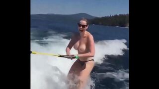 Topless beauty riding a water ski is incredibly erotic