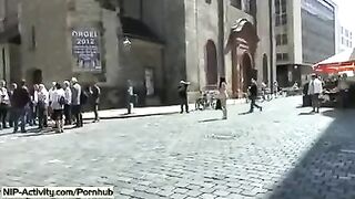 A girl showed her pussy to all passers-by on the city streets