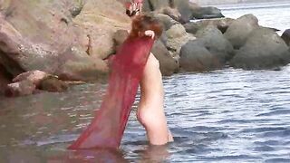 Nudist girl has small boobs and gets wet
