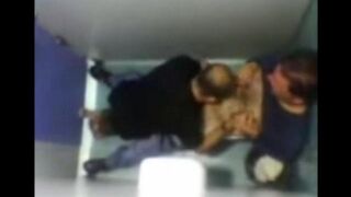A camera in the toilet caught some daring gay action