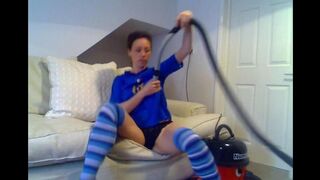 A girl uses a vacuum cleaner to reach orgasm, pleasuring herself with it