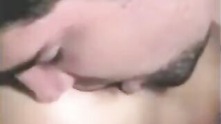 A guy was fucking with a strapon, while another girl was fingering his dick