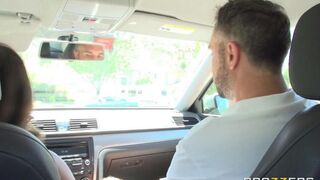 A cute girl is being fucked by a driving instructor in a car