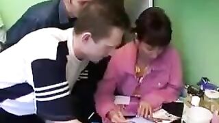 Hot Russian mom enjoys hardcore sex with four young guys at once
