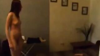 A pretty Russian babe masturbating in the kitchen