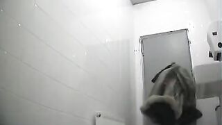 A hidden camera captured unexpected intimacy in a bathroom scene