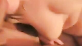 A fat woman spreads her legs to show her huge clitoris and pussy