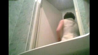 A hidden camera in the toilet captures a graduate in a compromising act
