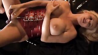 Busty blonde Rachel Aziani masturbates with a toy and reaches a powerful orgasm