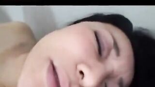 Mature Japanese man caresses his hairy pussy with his fingers and cock